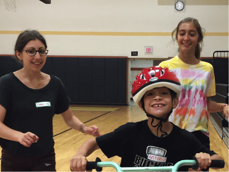 Antonio Randazzo gaining confidence with volunteers Elana and Lauren