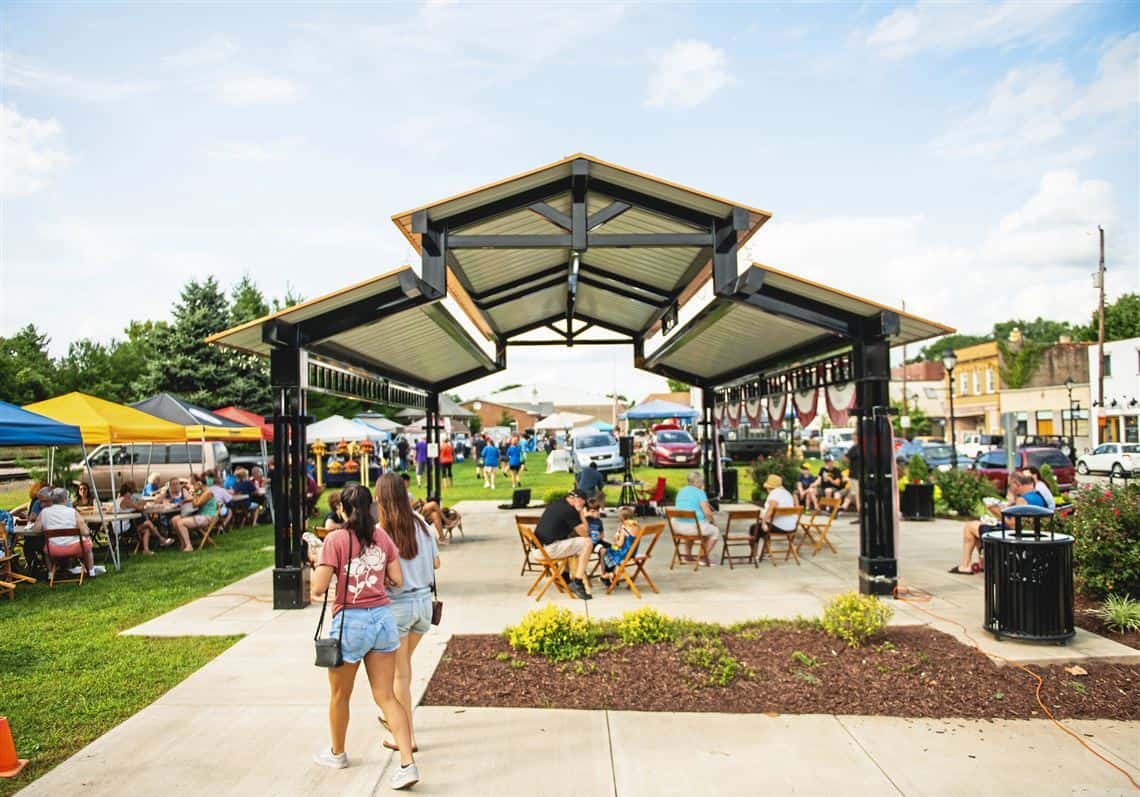 People enjoying a Verona community event outside