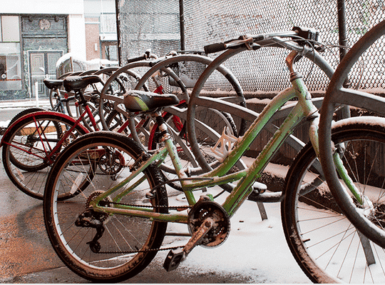 Picture of bikes locked to racks.