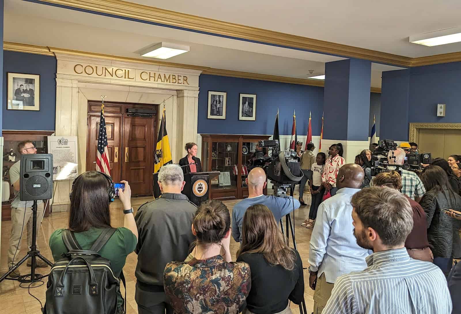 Councliperson Warwick addressing the crowd in front of City Council Chambers before announcing the introduction of her Vision Zero Resolution