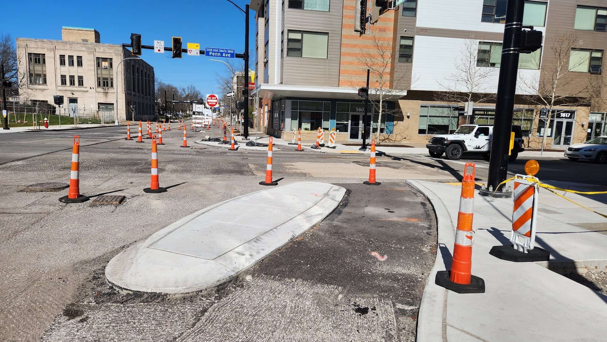 Image shows the future bike lanes, protected intersections and expanded sidewalks at the intersection of Penn Ave and Euclid St