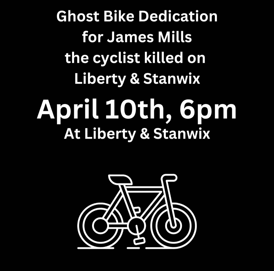 White text on black background says: Ghost Bike Dedication for James Mills, the cyclist killed on Liberty and Stanwix April 10th, 6pm at liberty an d stanwix