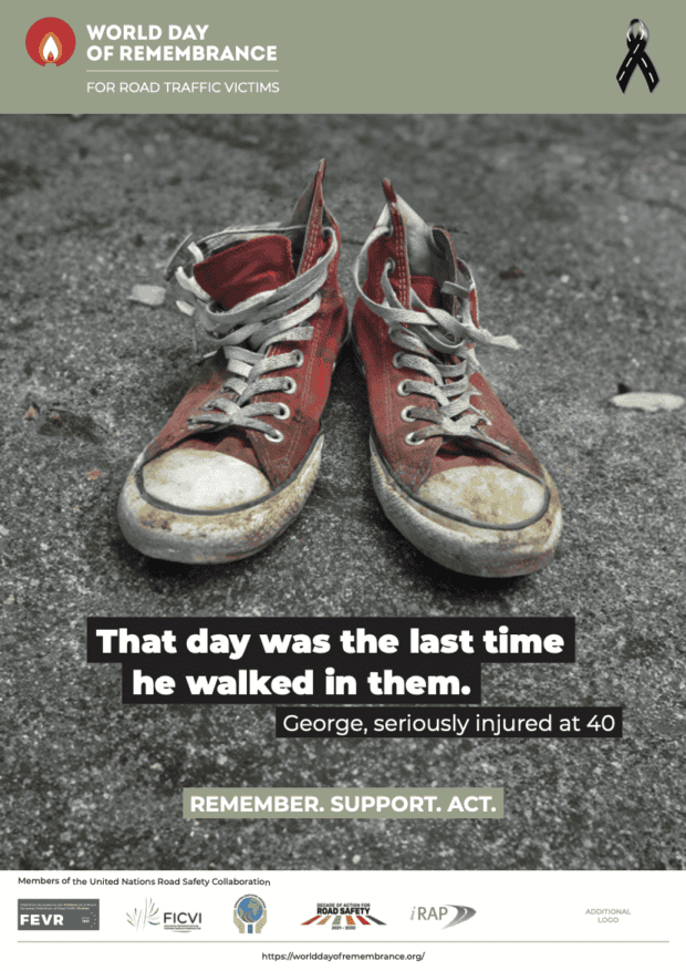 Picture of red sneakers, dirty and roughed up on asphalt. Text reads, "That day was the last time he walked in them. George, seriously injured at 40. Remember. Support. Act." With World Day of Remembrance Logo and black ribbon logo.