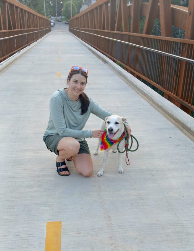 Jennifer Reitzell on the Davis Ave Bridge with her dog, Angie!