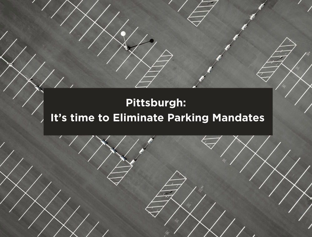 Image of a sprawling parking lot for cars. We shouldn’t let car storage take priority over people.