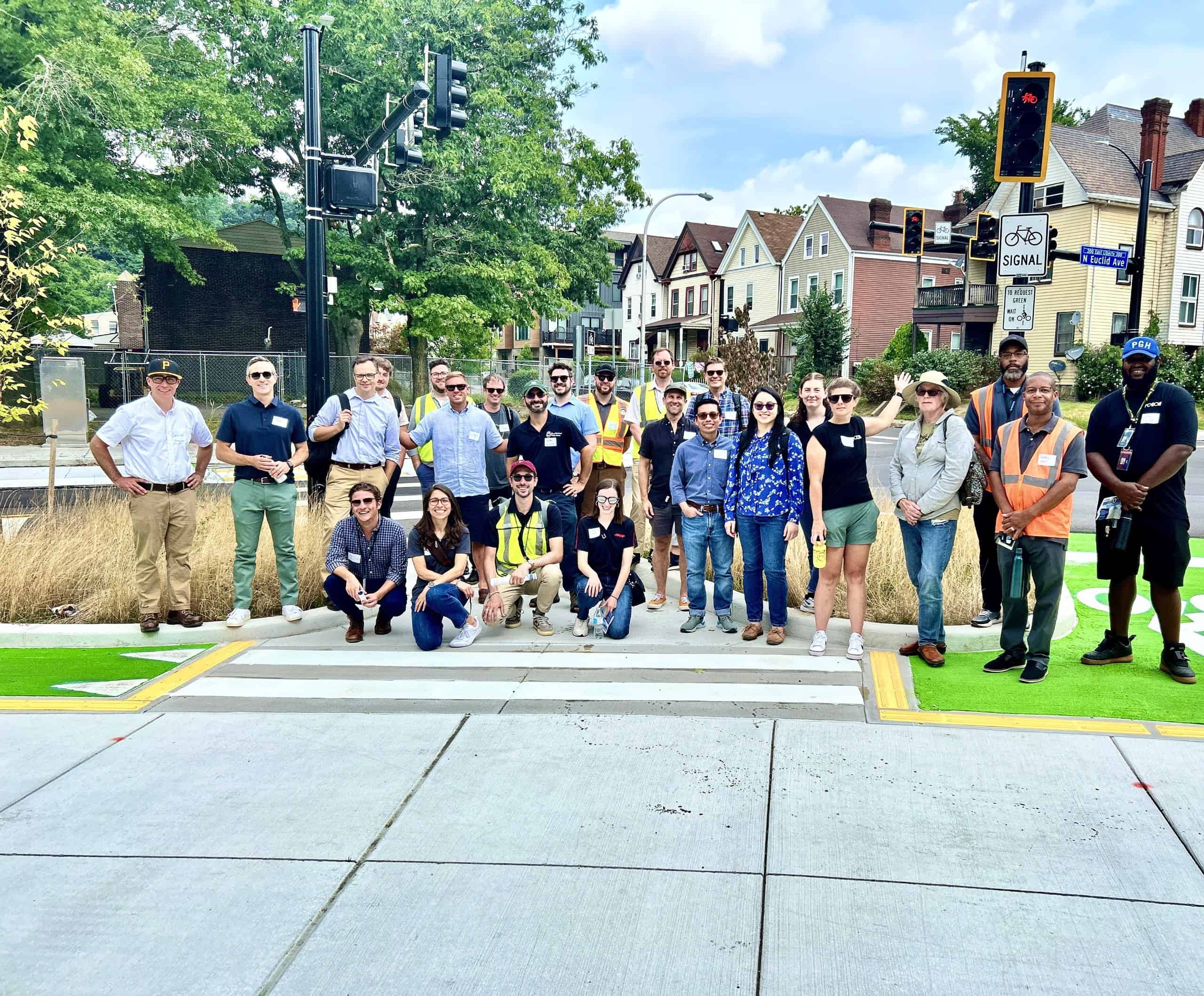 A picture of The City of Pittsburgh Complete Streets Advisory Group visiting the new Penn Circle Conversion project.