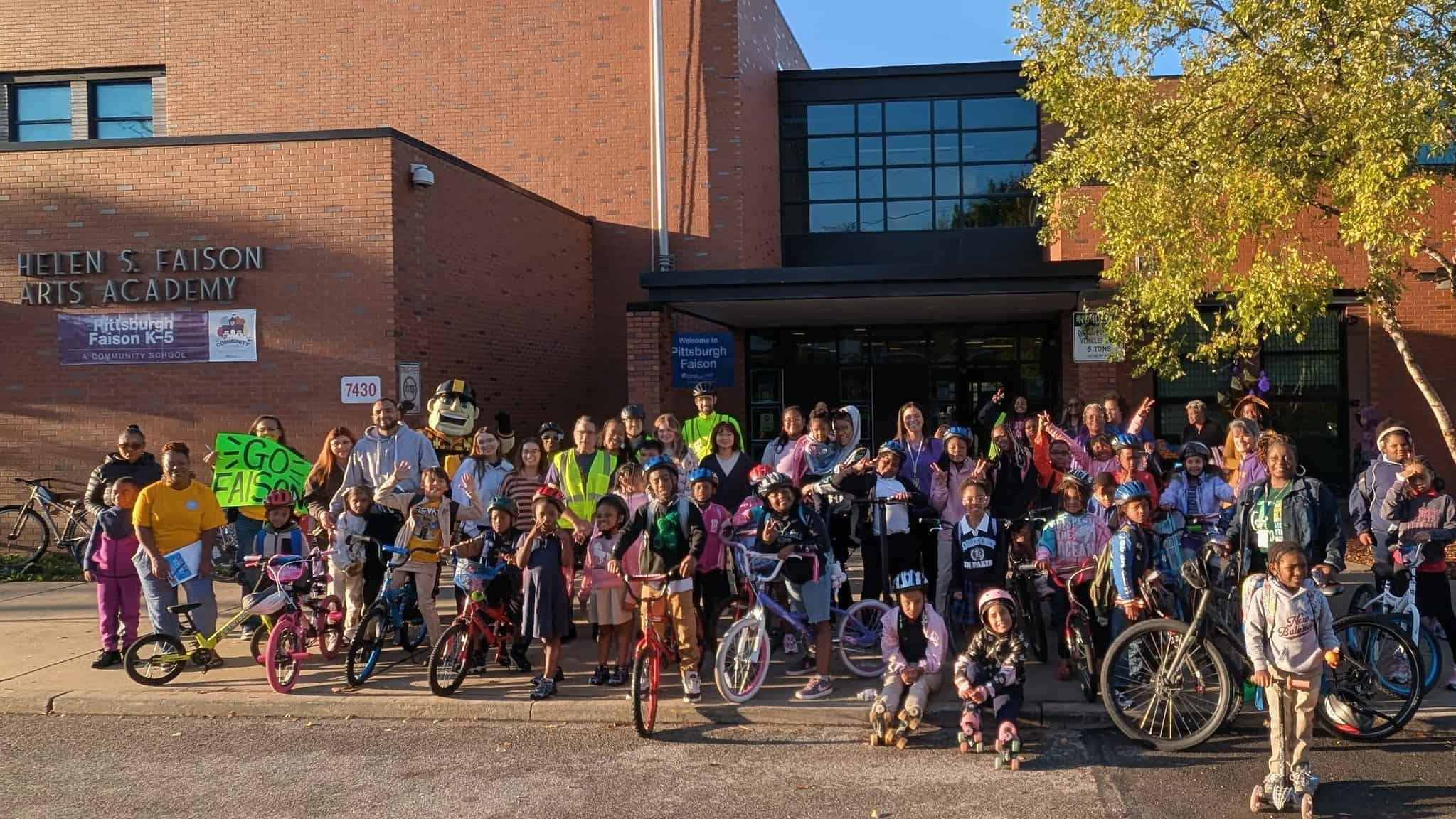 an image of a large crowd of children and adults at the 2025 Walk and Roll to School Day in Homewood