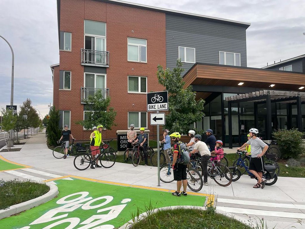Cyclists check out brand new sidewalk-level bike lanes in East Liberty.