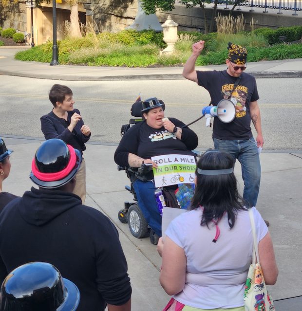 Alisa from Access Mob addresses the crowd at Station Square